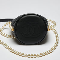 Excellent Pre-Loved Black Quilted Leather Mini Drawstring Bag with Pearl Shoulder Strap. (bottom)