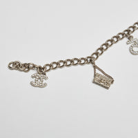 Excellent Pre-Loved Aged Champagne Gold Tone Chain Bracelet with Crystal Embellished iconic Charms.(charms)