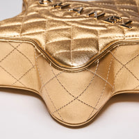 Pre-Loved Chanel™ Metallic Gold Star Purse (Collectors) (Corner)