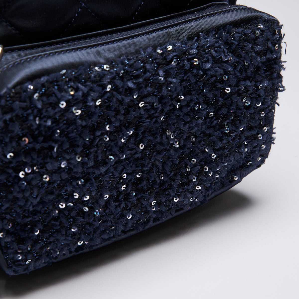 Excellent Pre-Loved Blue Sequin Tweed and Quilted Satin Panel Back Pack. (close up)