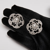 Pre-Loved Chanel™ Pearl & Strath Silver Metal Camellia Rhinestone Earrings(front)