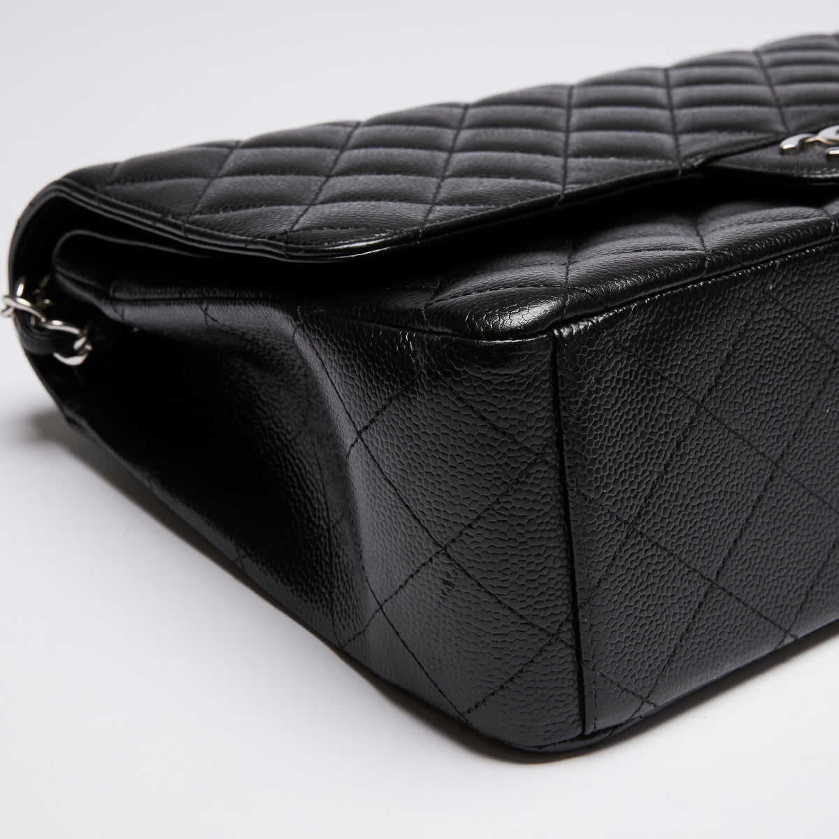 Excellent Pre-Loved Quilted Black Pebbled Leather Oversized Double Flap Chain Bag.(corner)