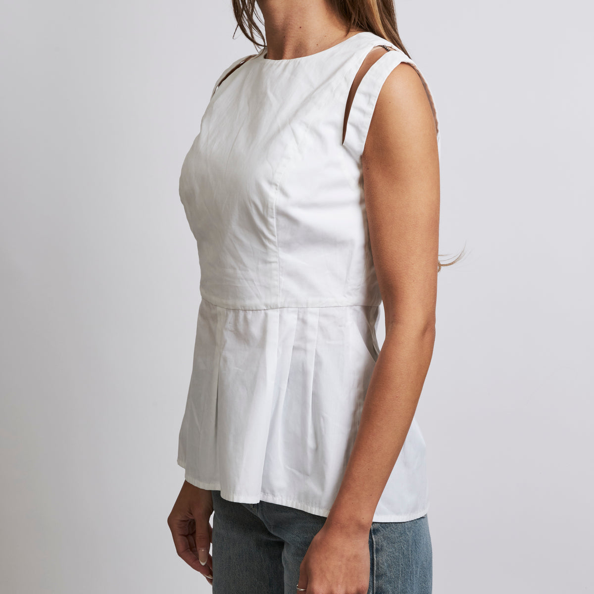 Excellent Pre-Loved White Cotton Sleeveless Peplum Top(side)