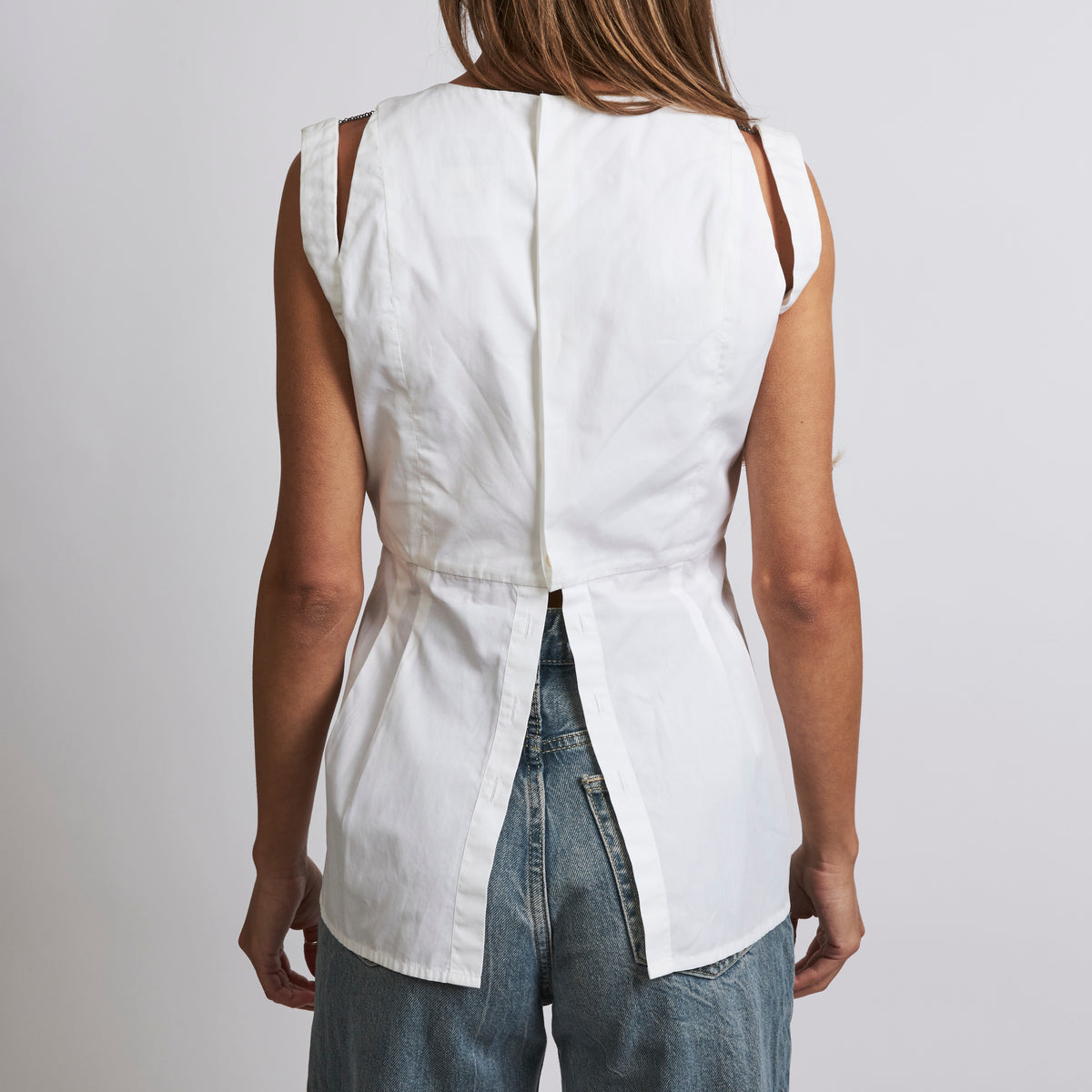 Excellent Pre-Loved White Cotton Sleeveless Peplum Top(back)