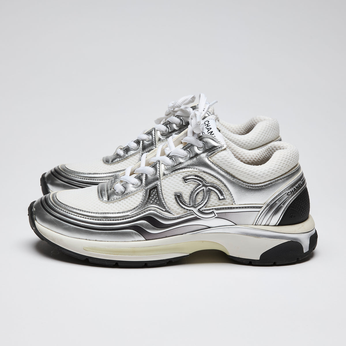 Pre-Loved Chanel™ Chanel 2023 Cruise Silver Sneakers - Fabric and Laminated Calfskin Leather Size 41