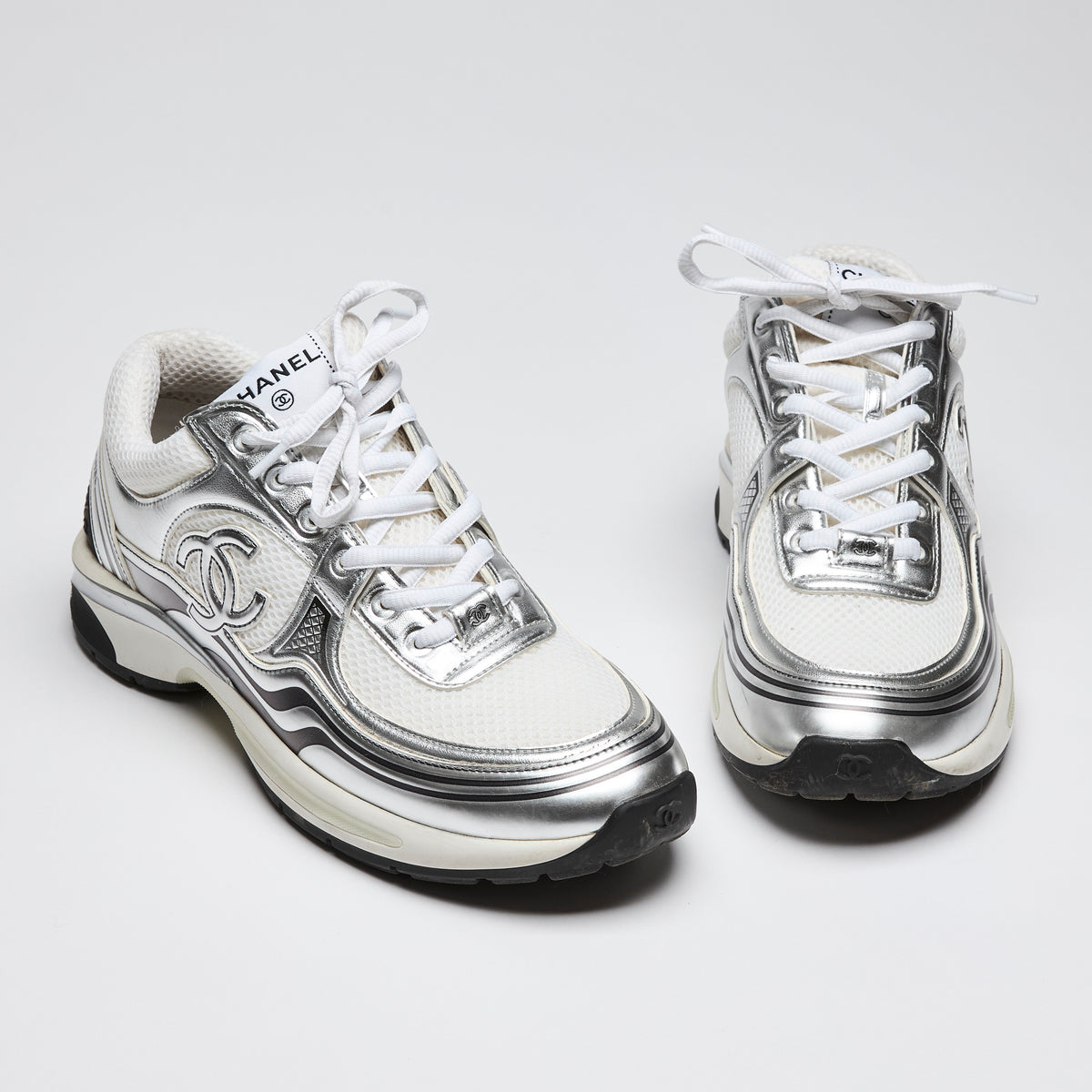 Pre-Loved Chanel™ Chanel 2023 Cruise Silver Sneakers - Fabric and Laminated Calfskin Leather Size 41