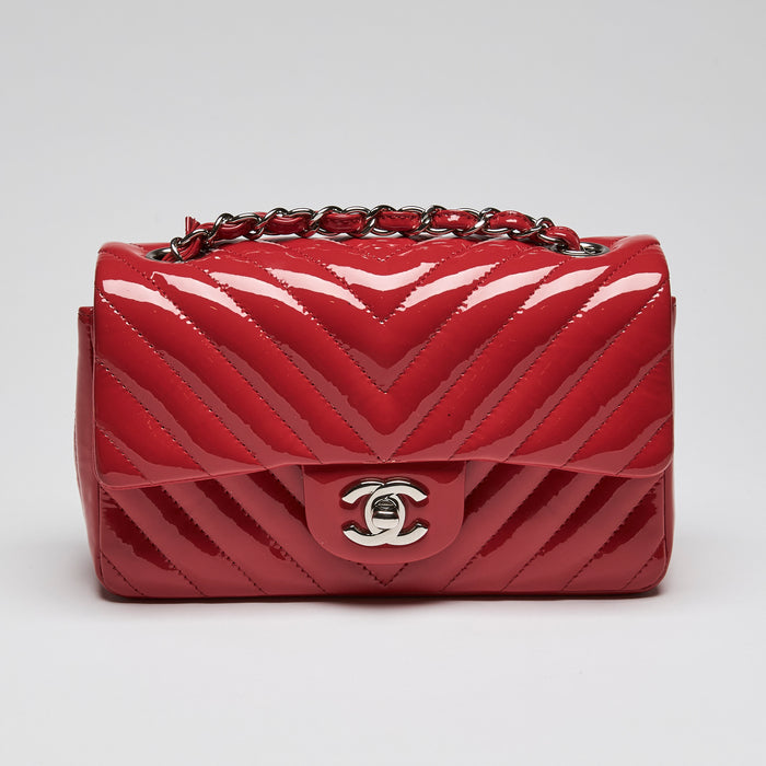 Pre-Loved Chanel™ Red Patent Leather Mini Chevron Flap Handbag