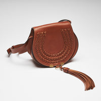 Excellent Pre-Loved Brown Leather Round Base Flap Bag with Tassel. (front)