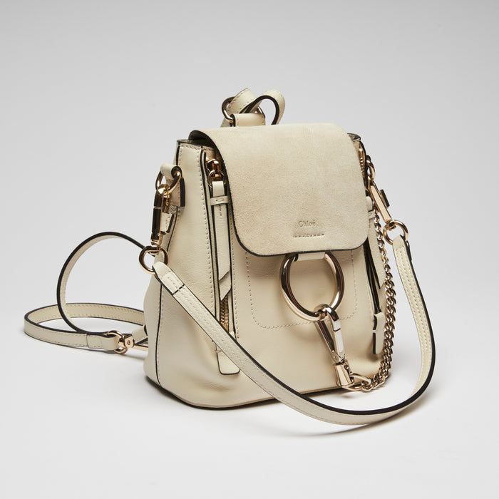 Excellent Pre-Loved White Suede and Leather Mini Backpack with Light Gold Hardware.(front)
