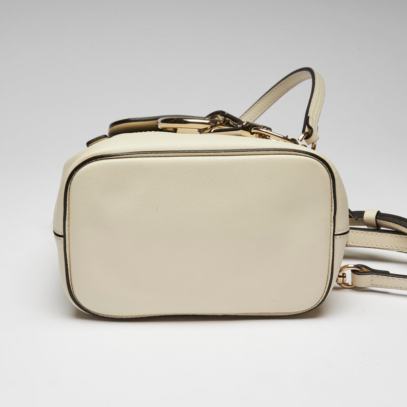 Excellent Pre-Loved White Suede and Leather Mini Backpack with Light Gold Hardware.(bottom)