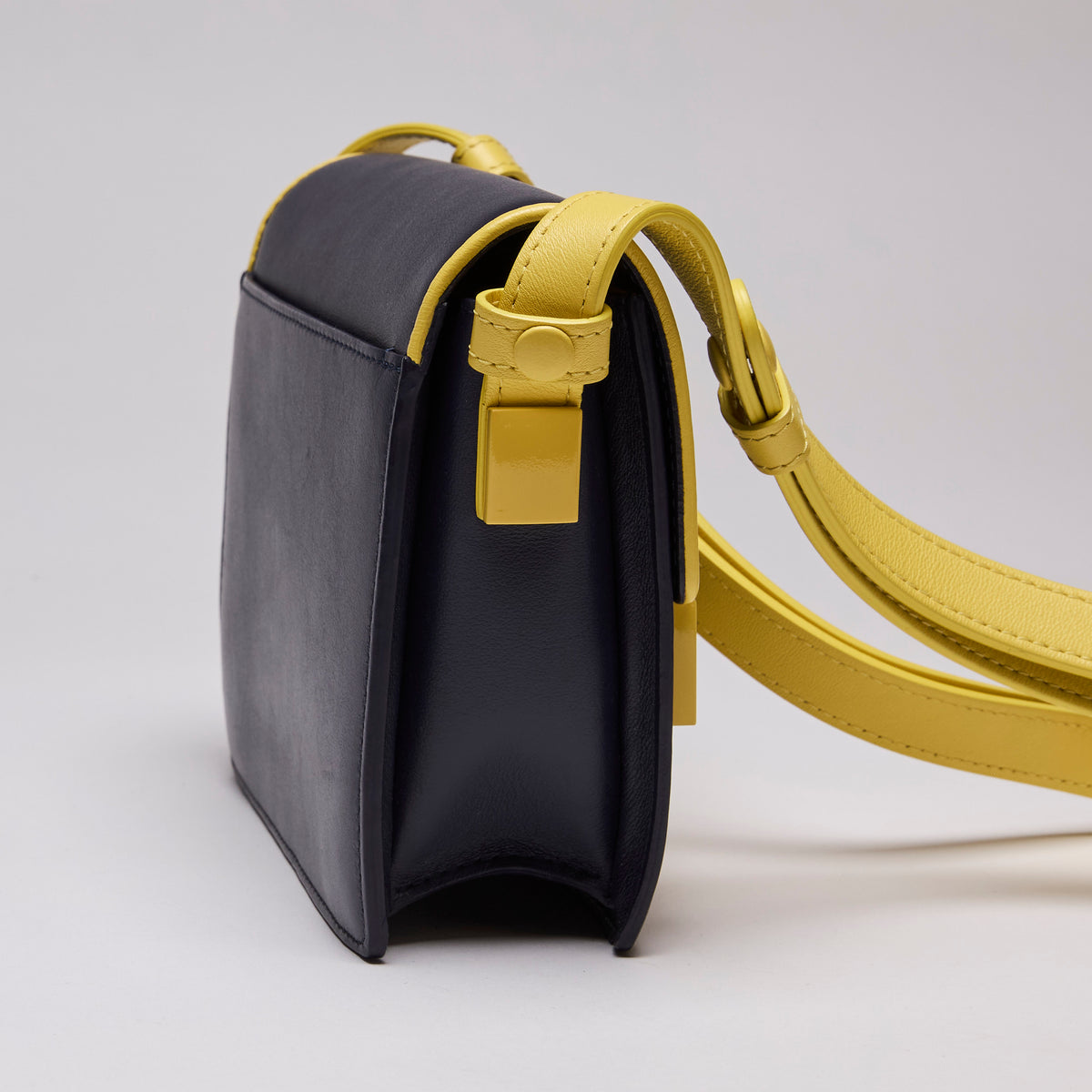 Delvaux Madame Mini Shoulder Bag in Navy & Yellow (Side)