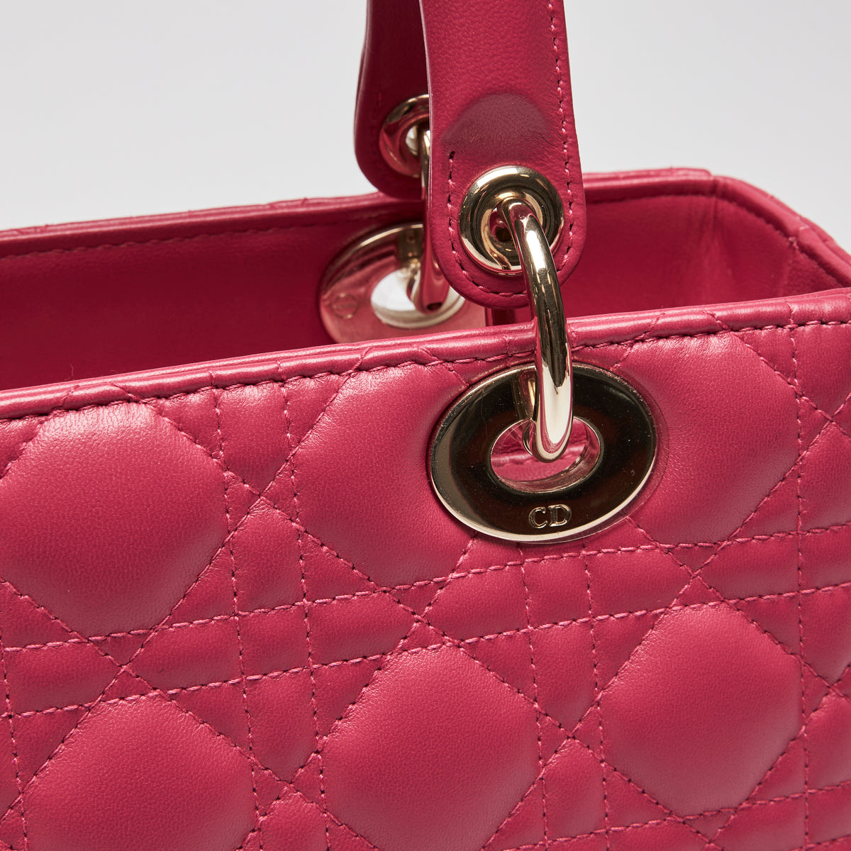 Excellent Pre-Loved Raspberry Cannage Leather Top Handle Bag.  (close up)