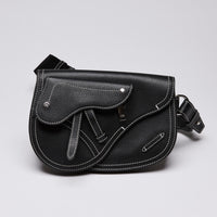 Dior X KAWS Small Black Pebbled Leather Saddle Bag with White Stitching Detail