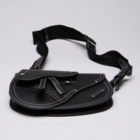 Dior X KAWS Small Black Pebbled Leather Saddle Bag with White Stitching Detail