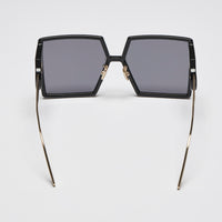 Excellent Pre-Loved Oversized Black Square Frame Sunglasses with Gold Details.  (back)