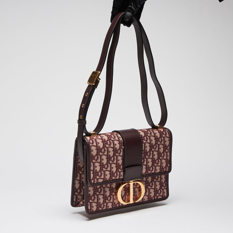 Excellent Pre-Loved Burgundy Monogram Canvas and Leather Flap Bag with Shoulder Strap.(side)