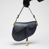 Pre-Loved Navy Blue Textured Leather Oblique Shape Shoulder Bag. (upright)