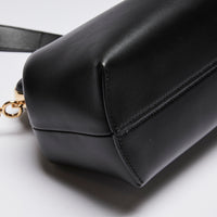 Excellent Pre-Loved Black Smooth Leather Asymmetrical Clutch Bag.(corner)