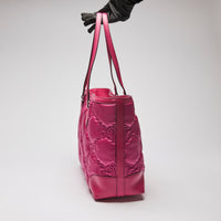 Excellent Pre-Loved Bright Pink Nylon and Leather Tote Bag.  (side)