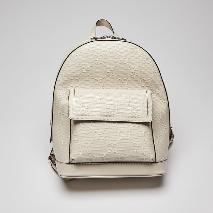 Excellent Pre-Loved White Logo and Diamond Patterned Perforated Leather Back Pack.(front)