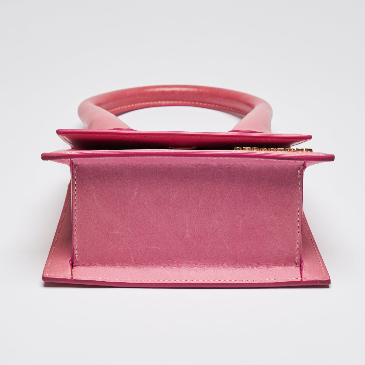 Pre-Loved Pink Leather Single Top Handle Mini Bag with Removable/Adjustable Shoulder Strap. (bottom)
