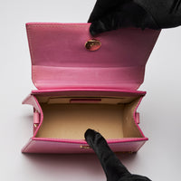 Pre-Loved Pink Leather Single Top Handle Mini Bag with Removable/Adjustable Shoulder Strap.  (interior)