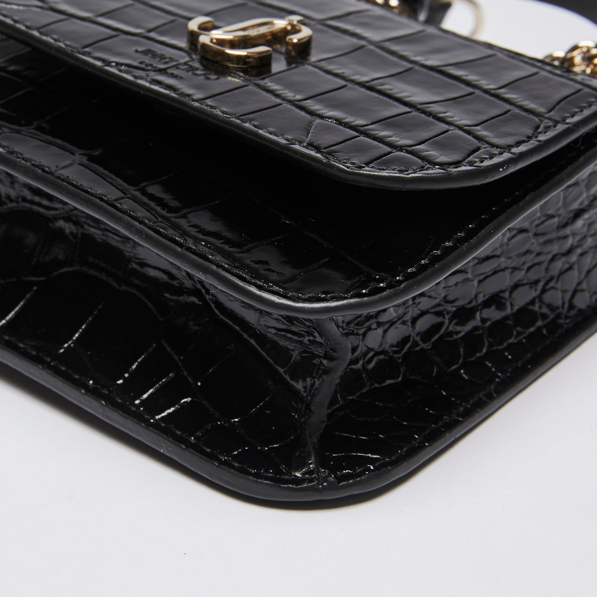 Excellent Pre-Loved Shiny Black Croc Embossed Leather Mini Chain Top Handle Bag. (corner)