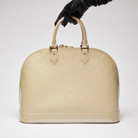 Pre-Loved Large Monogram Embossed Ivory Patent Leather Half Dome Shaped Top Handle Bag.  (back)