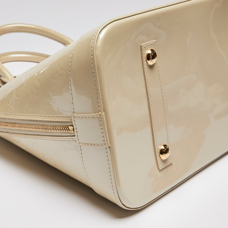 Pre-Loved Large Monogram Embossed Ivory Patent Leather Half Dome Shaped Top Handle Bag.  (corner)