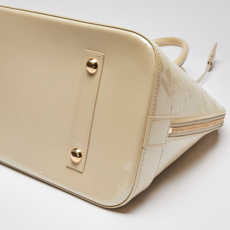 Pre-Loved Large Monogram Embossed Ivory Patent Leather Half Dome Shaped Top Handle Bag.  (corner)