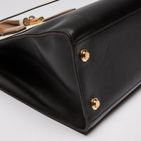 Excellent Pre-Loved Ivory/Dark Beige/Black Smooth Leather Top Handle Bag. (corner)