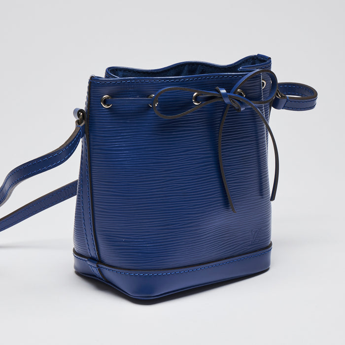 Excellent Pre-Loved Blue Textured Leather Mini Bucket Bag. (front)
