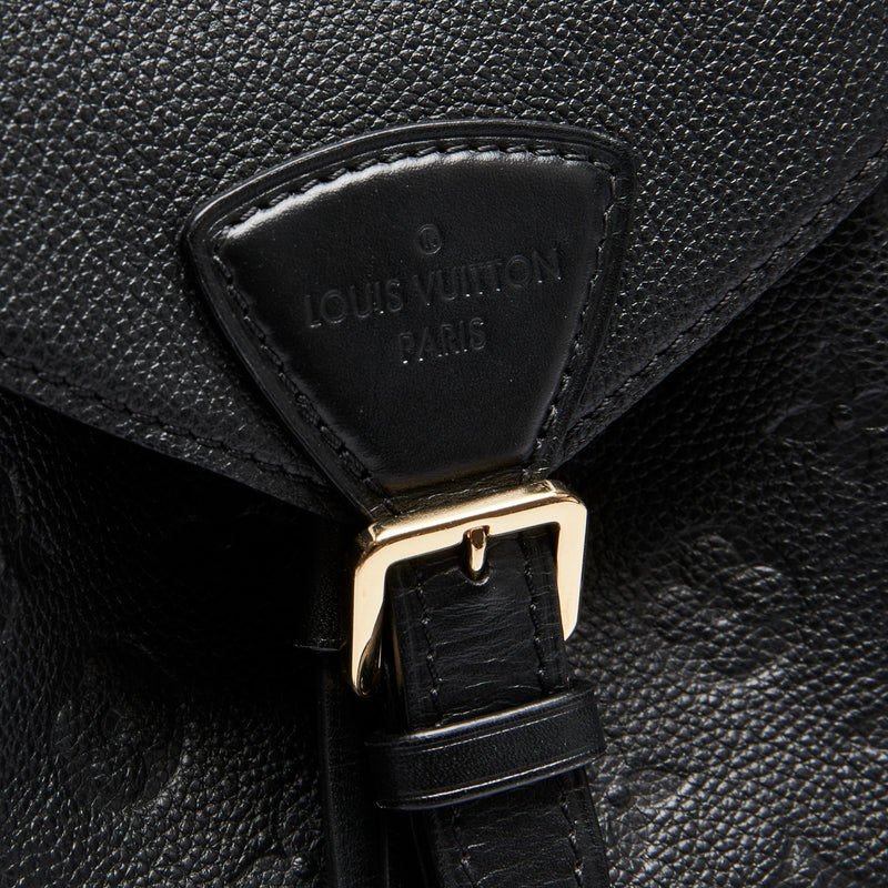 Excellent Pre-Loved Black Monogram Embossed Grained Leather Back Pack.(logo)