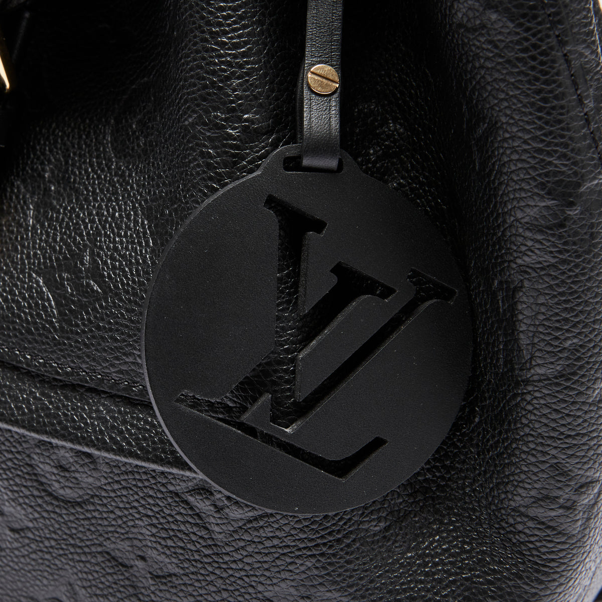 Excellent Pre-Loved Black Monogram Embossed Grained Leather Back Pack.(logo)