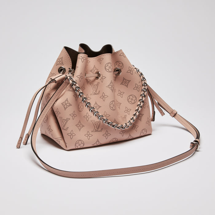 Excellent Pre-Loved Pink Perforated Monogram Leather Bucket Bag. (front)