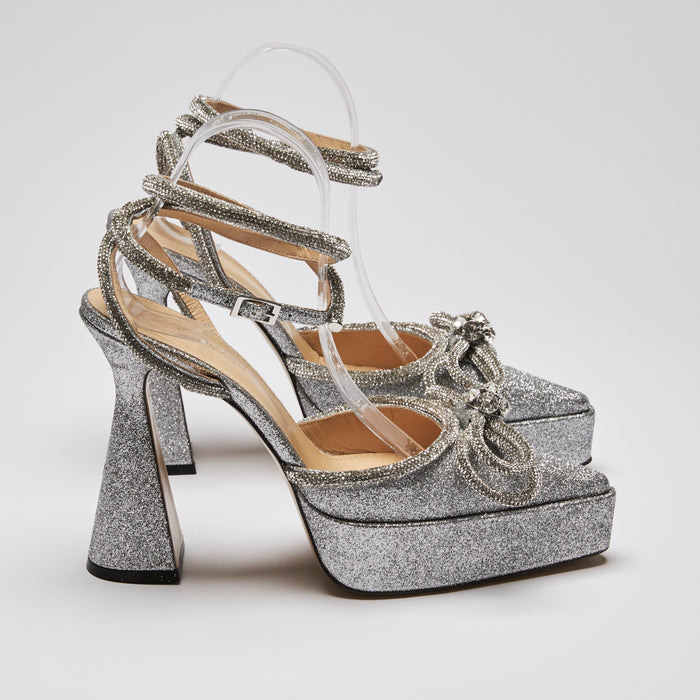 Excellent Pre-Loved Silver Glittered Point Toe Platform Heels with Ankle Straps and Crystal Embellished Double Bow(side)