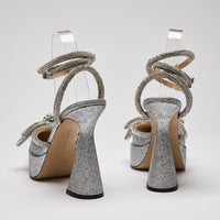 Excellent Pre-Loved Silver Glittered Point Toe Platform Heels with Ankle Straps and Crystal Embellished Double Bow(back)