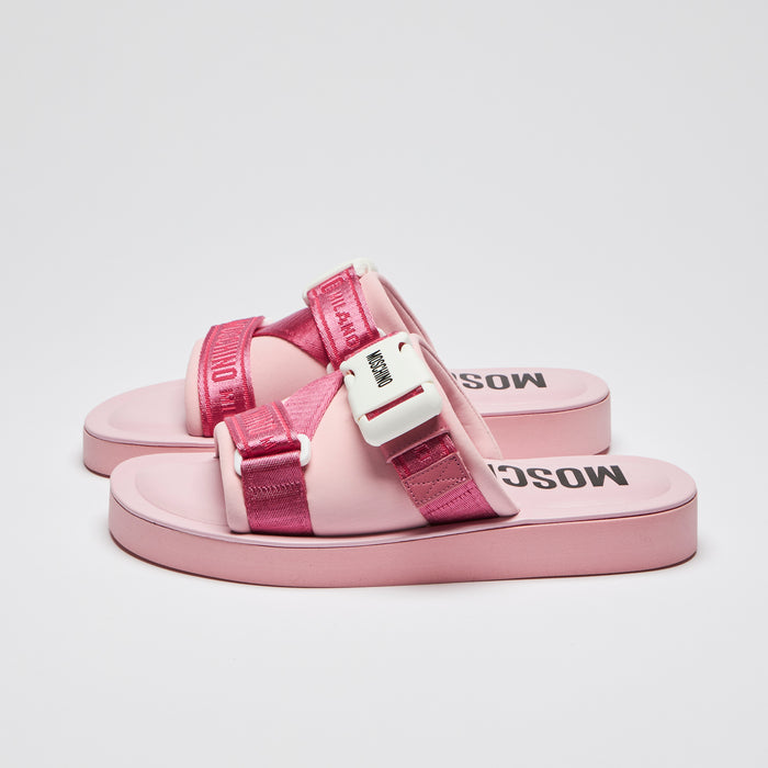 Excellent Pre-Loved Pink Slides with White Buckle Detail and Pink Ribbon Logo Strap. (side)