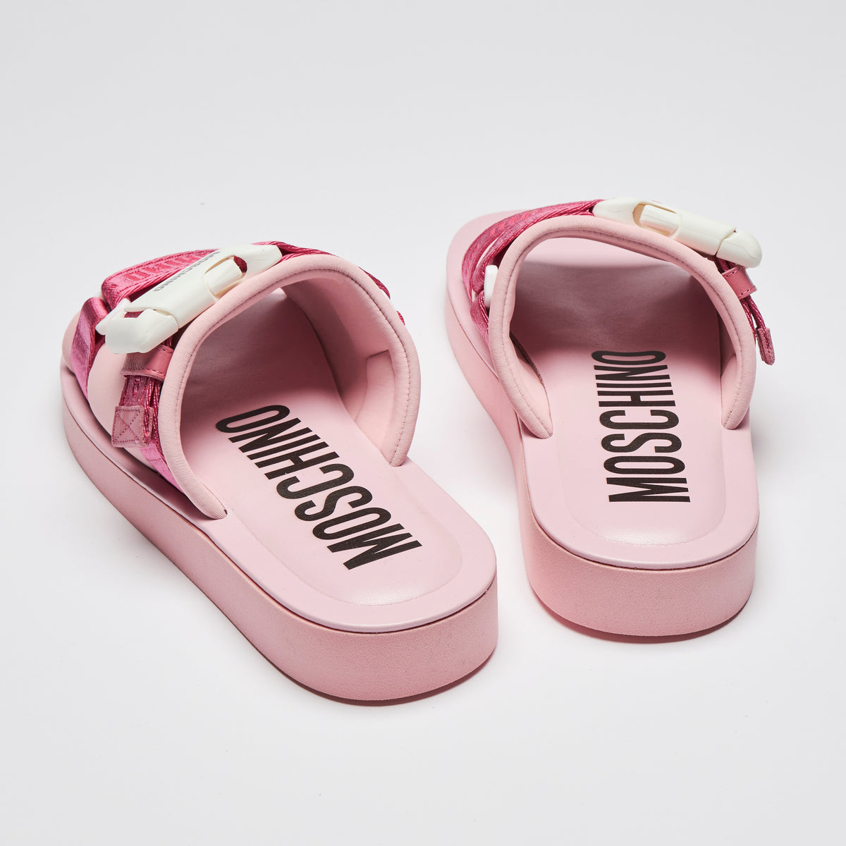 Excellent Pre-Loved Pink Slides with White Buckle Detail and Pink Ribbon Logo Strap. (back)
