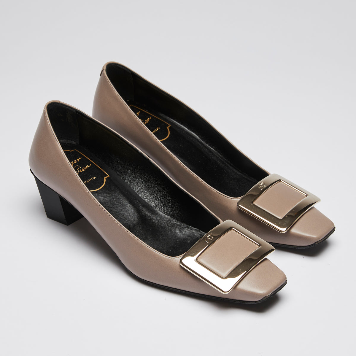 Pre-Loved Taupe Smooth Leather Square Toe Kitten Heels with Black Leather Lining and Silver Buckle Ornament.(front)