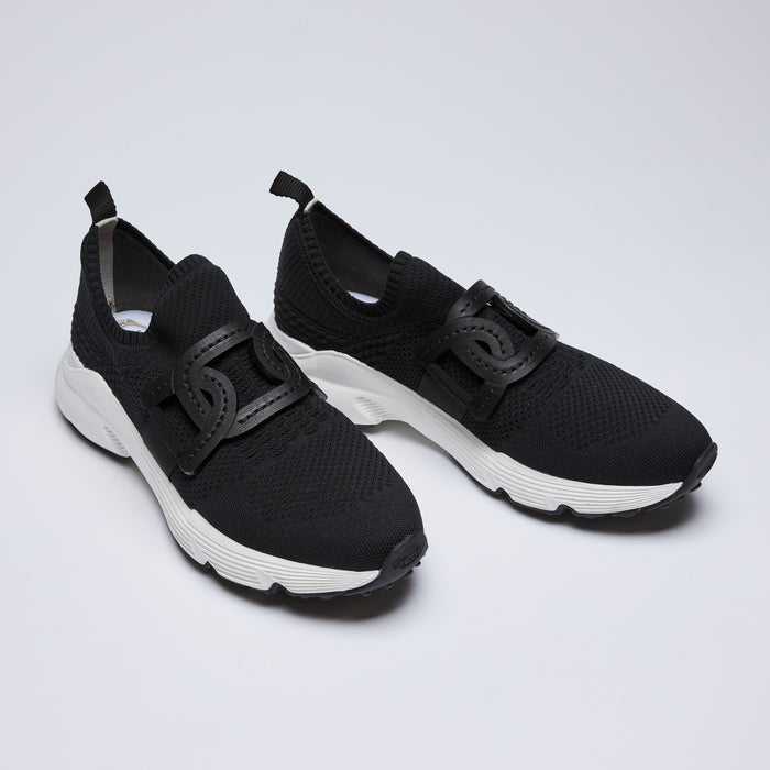Excellent Pre-Loved Black Mesh Slip On Sneakers with White Rubber Soles and Black Leather Detail.(front)