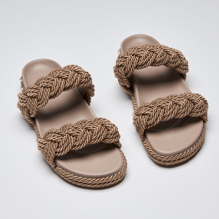 Excellent Pre-Loved Taupe Slides with Rose Gold Tone Braided Straps and Trim.  (front)
