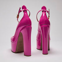 Excellent Pre-Loved Neon Pink Patent Leather Platform Heels with Ankle Straps.(back)
