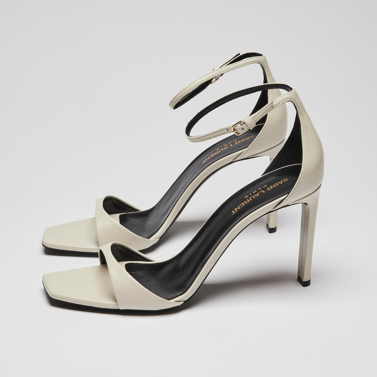 Excellent Pre-Loved White Leather Strappy Open Toe Sandals with Ankle Straps.(side)
