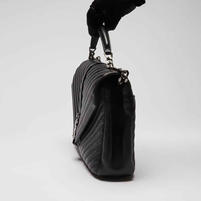 Pre-Loved Black Grained Leather Chevron Stitched Flap Bag with Removable Shoulder Chain and Handle.(side)