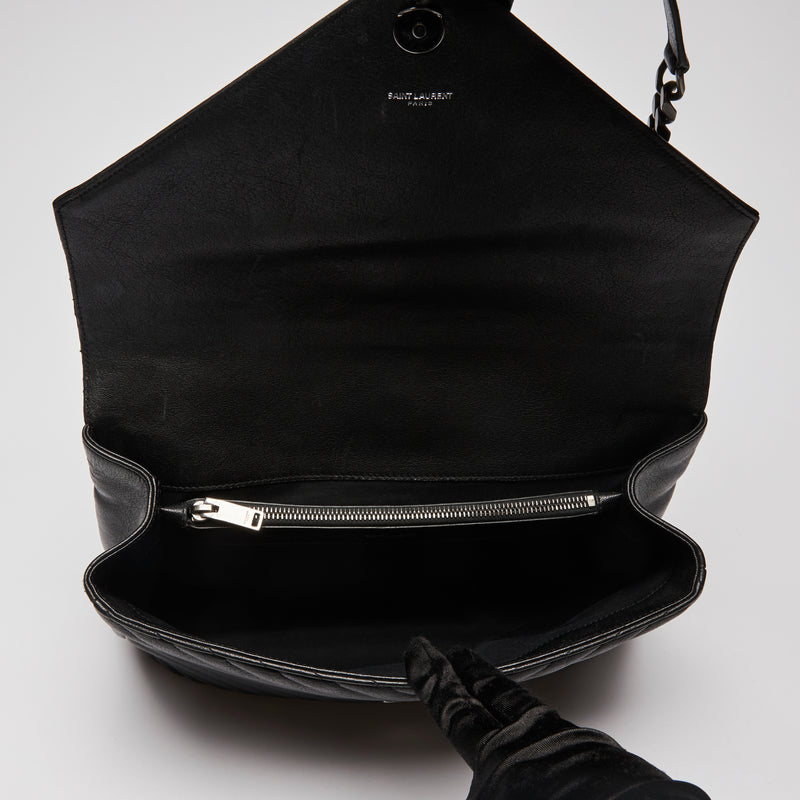 Pre-Loved Black Grained Leather Chevron Stitched Flap Bag with Removable Shoulder Chain and Handle. (interior)