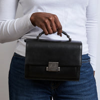 Excellent Pre-Loved Black Smooth Leather Top Handle Flap Over Shoulder Bag with Aged Silver Tone Hardware(on body)