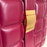 Burgundy Distressed Leather with Large Puff Waffle Patterned Vertical Tote Bag (close up clasp view)