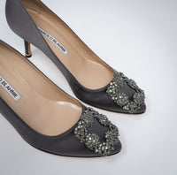 grey satin heels with dark silver buckle ornament (front view)