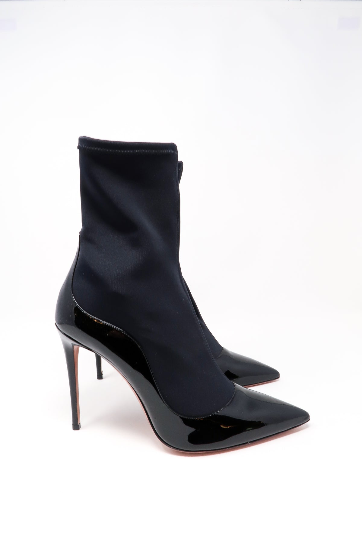 black patent leather heels with black nylon ankle socket attachment (side view)